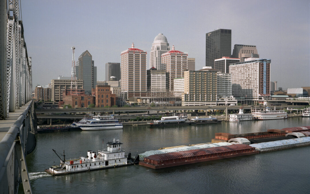 Louisville Kentucky downtown skyline along the Ohio River showing the urban core where Museum Row anchors the city's cultural identity