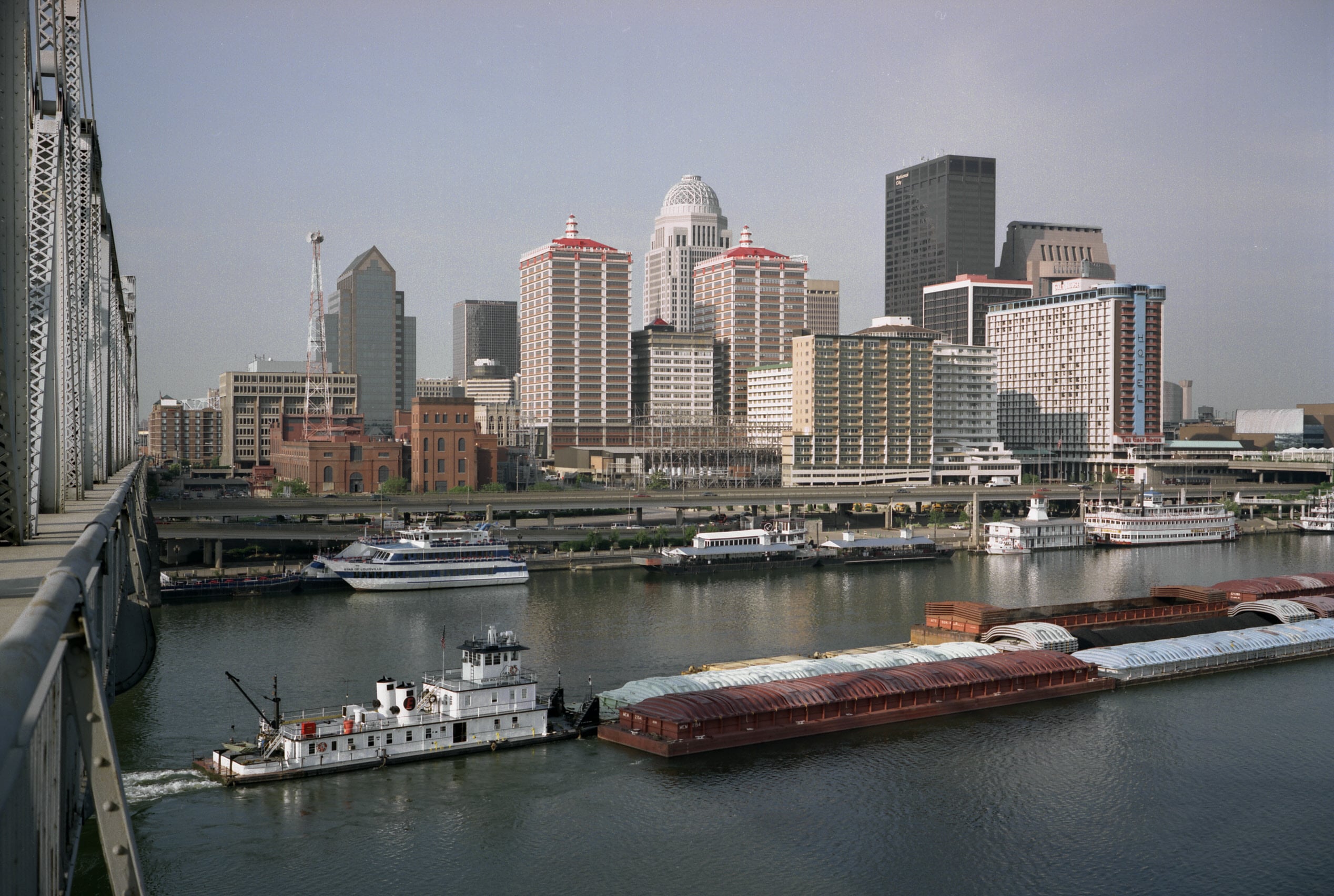 Louisville Kentucky downtown skyline along the Ohio River showing the urban core where Museum Row anchors the city's cultural identity